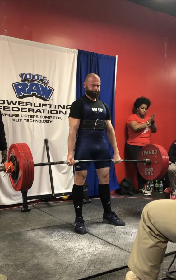 Vadim Snitkovsky locking out a deadlift at a 100% RAW Powerlifting Federation meet
